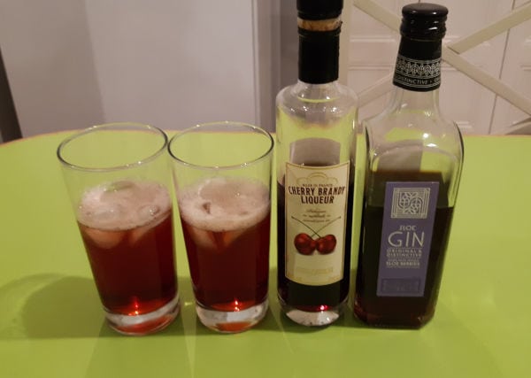 Try cherry brandy liqueur with sloe gin and tonic water. 