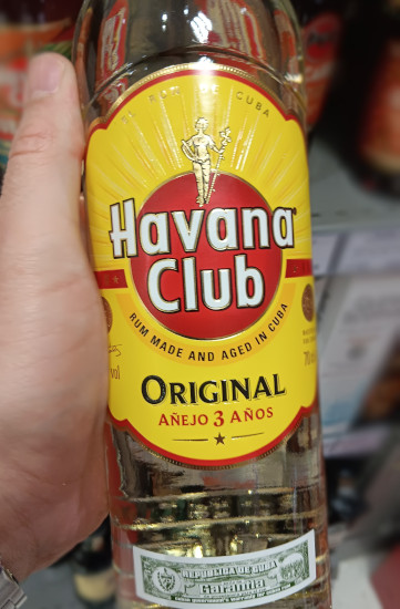 Andrew holding bottle of Havana Club 3 Original